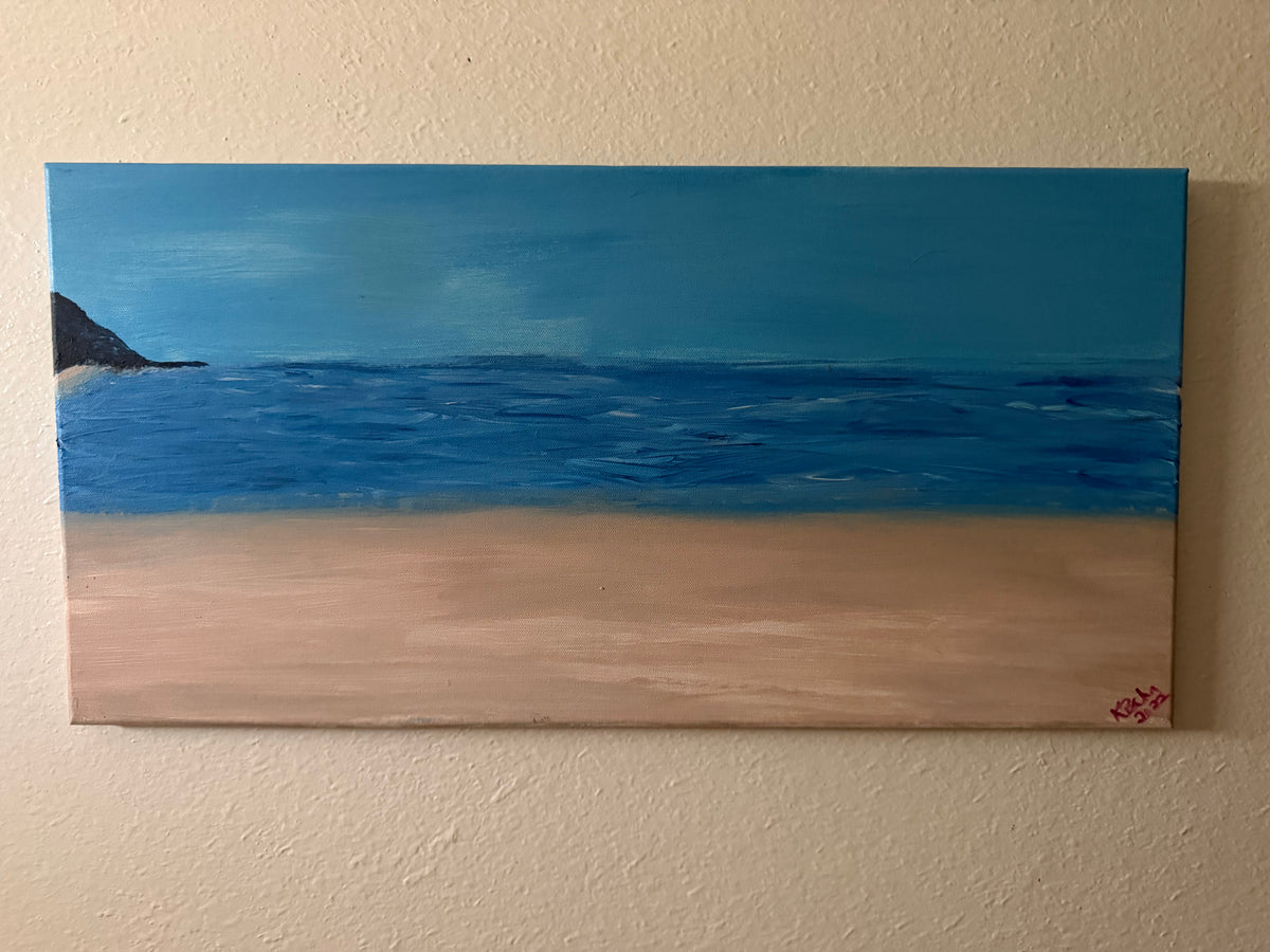 Shoreline original acrylic seascape painting 24x12 framed — calm beach with blue ocean, warm sand, and headland on left horizon